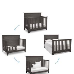 Convertible toddler/crib bed