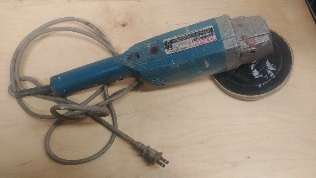 Makita polisher with hook and loop pad