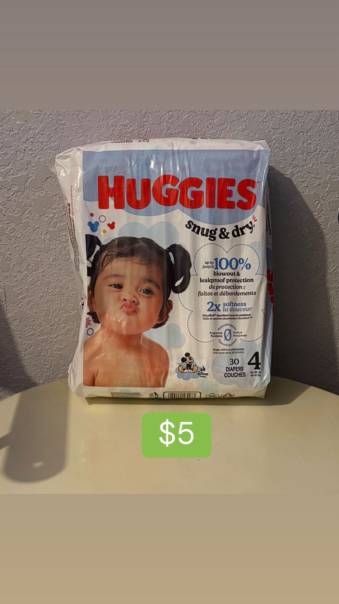 Huggies Snug & Dry Baby Diapers, Size 4 (22-37 lbs), 30 Count