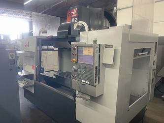 2012 HAAS VF-4 with 10,000 RPM Spindle, 4th Axis Ready, 24+1 Side-mount ATC