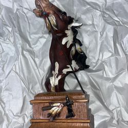 Native American-themed horse sculpture, possibly "Warrior's Journey