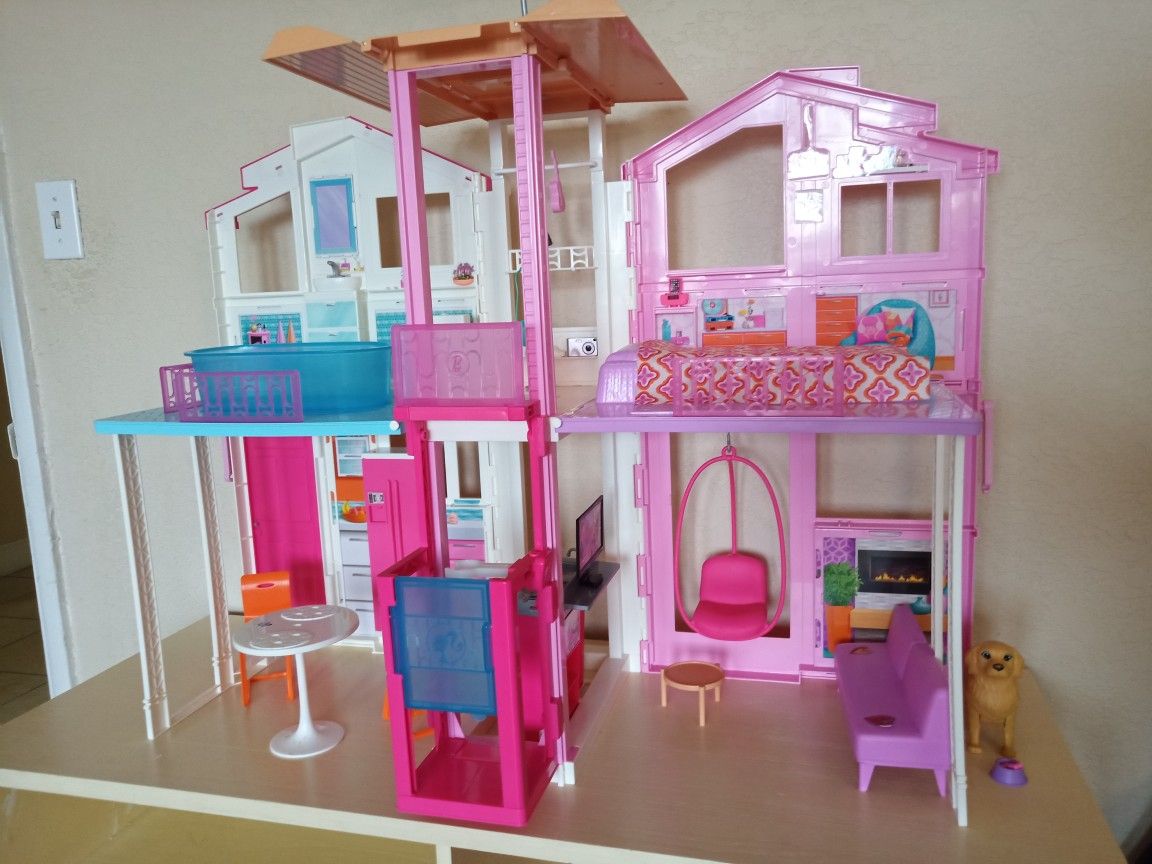 Barbie doll house with lots of extras (110.00)