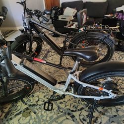 BRAND NEW STILL HAVE THE LITTLE NUBS ON THE TIRES. 2 Rad Power Bikes Red Rover 6 Plus. A Step through And A High Bar. Male And Female