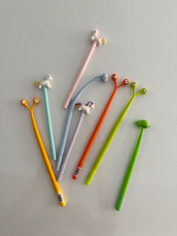 Pens With Assorted Figures