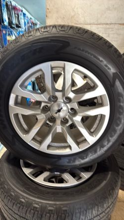 Chevy Tahoe. Silverado Eighteen inch original Rims.