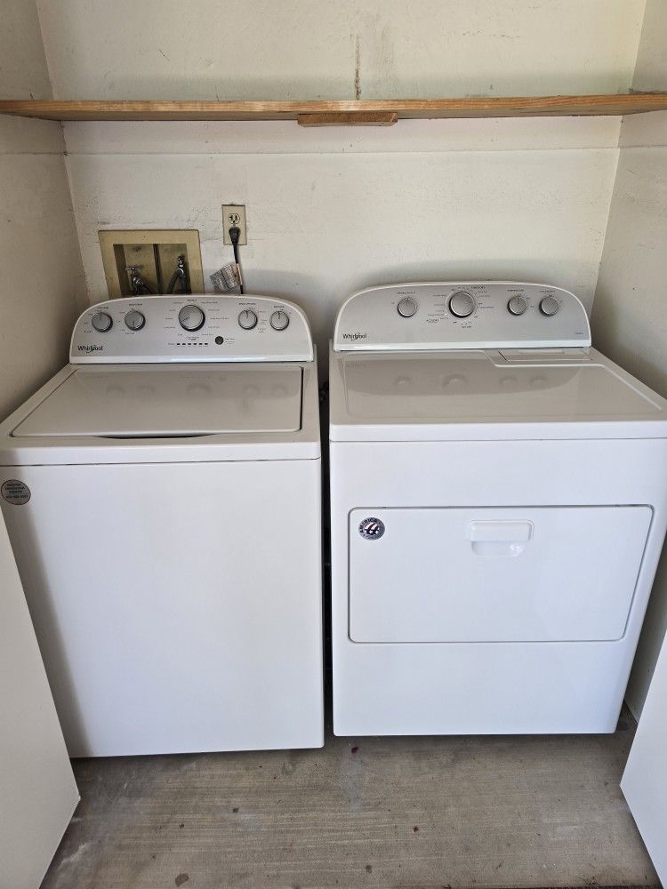 Whirlpool white top load washer and electric dryer set