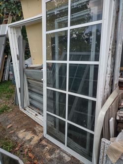 two sets of impact doors against hurricanes, two doors with double glass, both sets with frames, they are second-hand but they are in very good condit