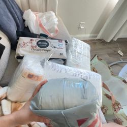 newborn and size 1 diapers doesn’t fit my baby anymore   newborn is a mix of mostly pampers and Huggies but there is some parents choice diapers in th