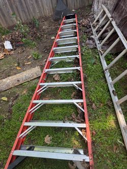 2 Long aluminum ladders