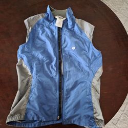 Pearl Izumi women's blue and gray mesh-backed full-zip cycling vest.
