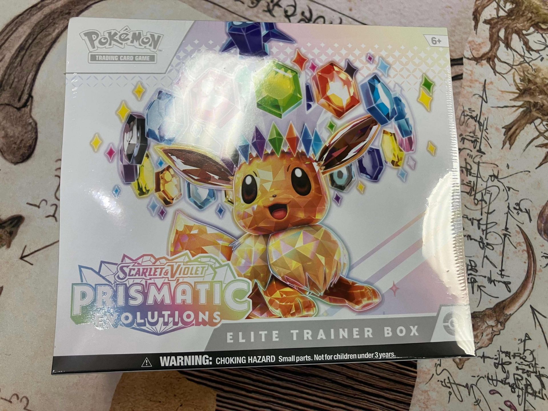 Prismatic Evolution Elite Trainer Box