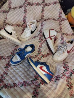 2  woman's Nike  blazers and 1 dunk Jordans