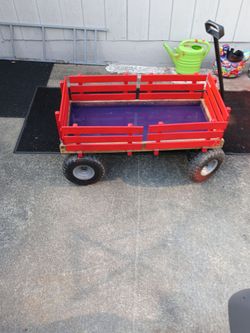 Wagon with new flat free tire , painted $55 firm price