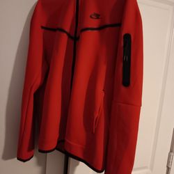Red Nike Tech Hoodie.