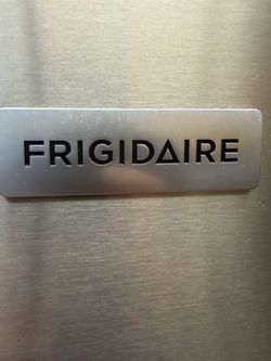 Refrigerator, stainless steel Frigidaire, like new must sell