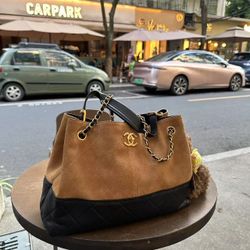 Fashionable brown suede leather bag