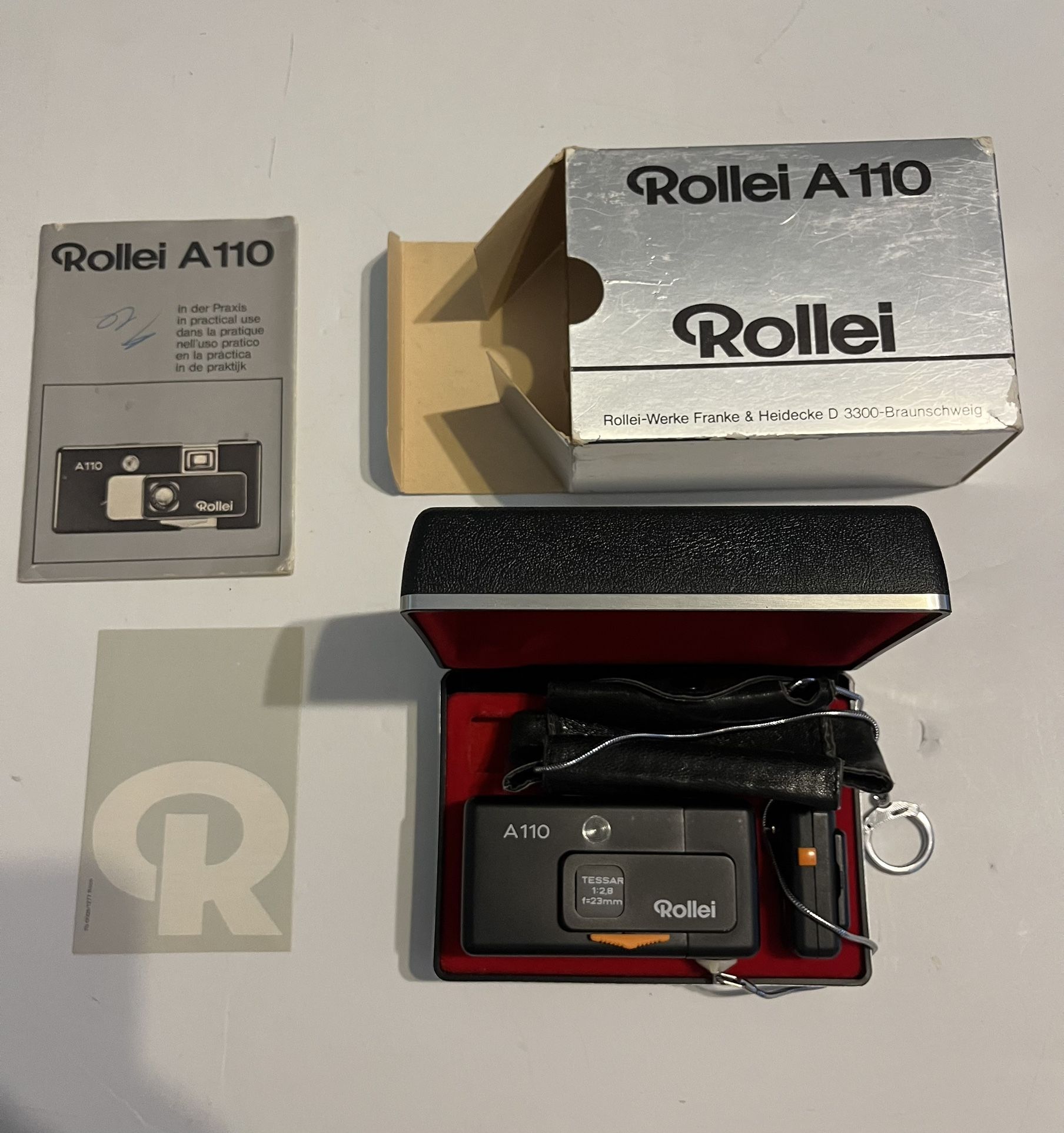 Near mint Rollei A110 Germany In Complete Box ,Flash Door ,Leather Pouch - Chain