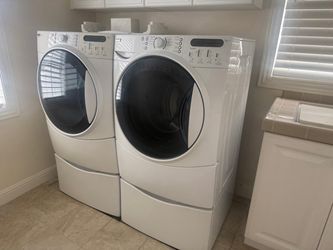 Maytag Front-Load Washer and Dryer Set with Pedestals