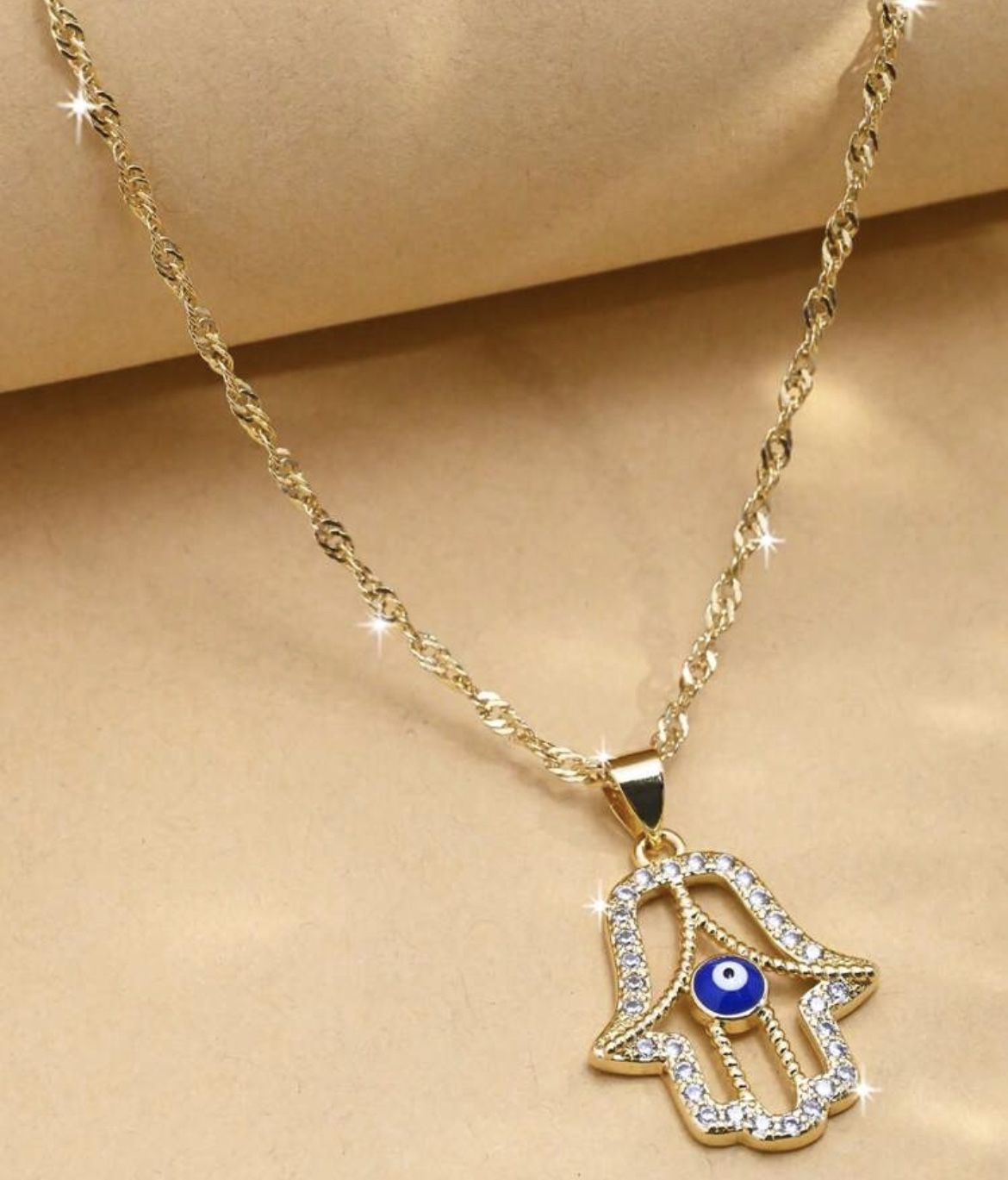 Gold Hamsa Necklace with Blue Eye Pendant