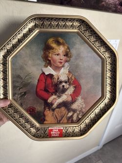 Victorian style biscuit tin Boy on one sude girl on other