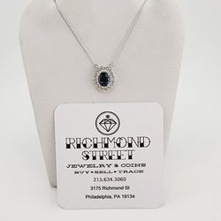 10k white gold 16"-18" chain with diamond and london blue topaz pendant