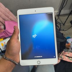 device is an Apple iPad (6th generation), specifically model A2126, featuring cellular connectivity and finished in gold.