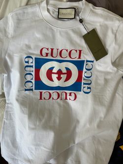 Gucci shirt fits like large -Xl new