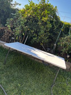 Used like new 6 Feet foldable/portable table.