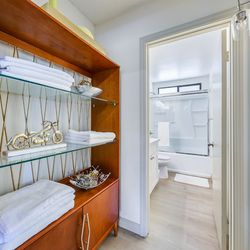 Mid-Century Modern Walnut Display Cabinet with Brass Lattice & Glass Shelves