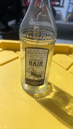 Spider Hair Extract Novelty Glass Bottle