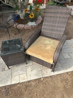 Reclining chair with small table