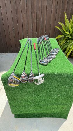 Ping G30 iron set with Scotty Cameron putter drivers