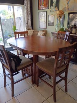 Solid Dark Wood Oval Dining Table & 4 Padded Chairs Set (with Storage Base)