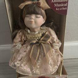 Collectors Choice Genuine Fine Bisque Musical Animated Porcelain Doll 