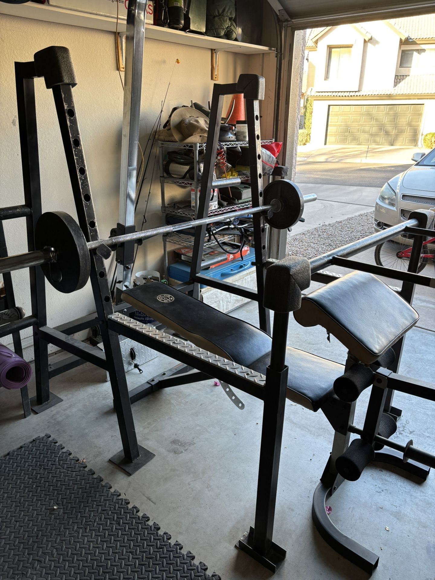 Home gym - Custom built Bench press / squat rack with weights and accessories.