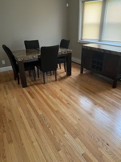 Dinning room table, chairs and credenza