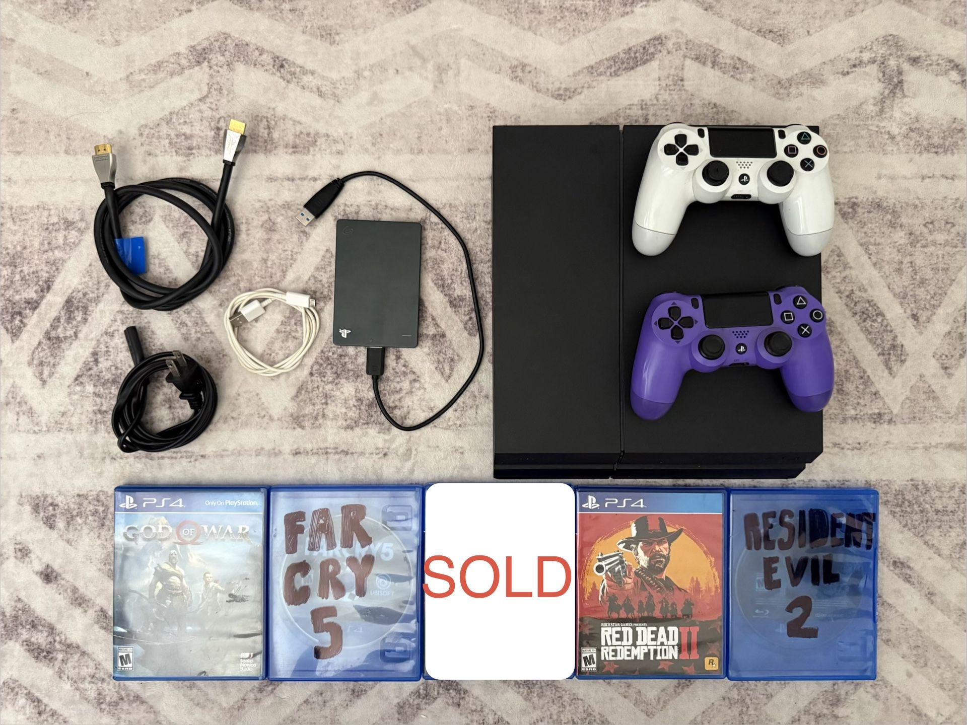 Playstation 4 with 2 Controllers, 4 Games, and 2TB Hard Drive Bundle
