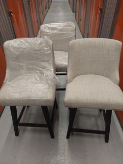 Three Swivel Bar/Counter Chairs