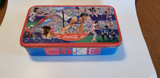 Vintage coke sports themed tin