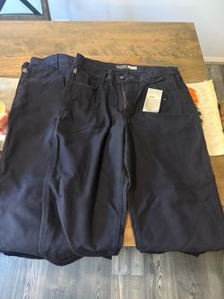 Two pairs of Carhartt FR loose fit pants