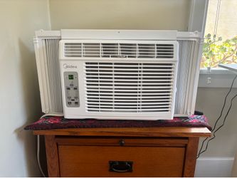 Window A/C unit.