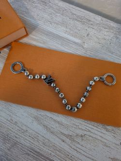 Louis Vuitton chain belt wallet