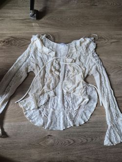 White lace top with tie front with flared sleeves