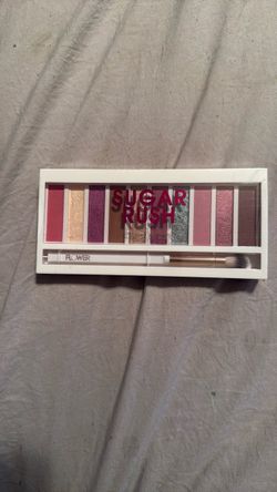 Sealed in cellophane never been opened brand, new Flower Beauty Sugar Rush Eyeshadow Palette