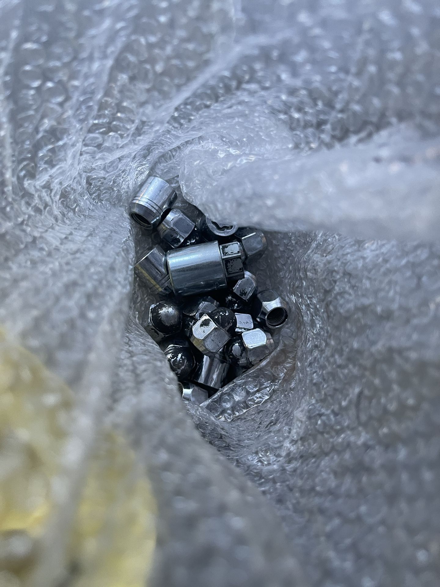 Bag Of OEM Subaru Lug Nuts And Lock Nuts