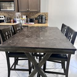 Used Table  $100.00 OBO.    4 Chairs Included 