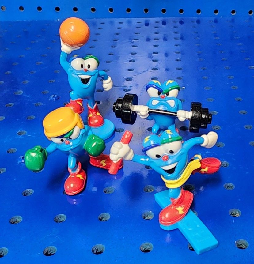 "Izzy" figurines, the official mascot for the 1996 Summer Olympics in Atlanta.