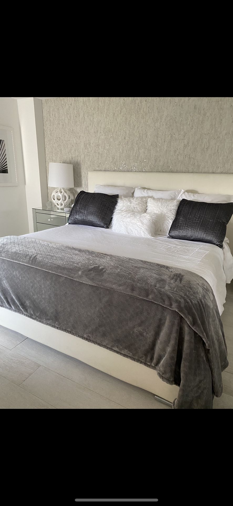 king size bed … all white ..leather headboard … mattress included… leather framing … mattress sits on slats..