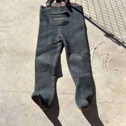 This is a pair of Remington neoprene chest fishing waders. 
