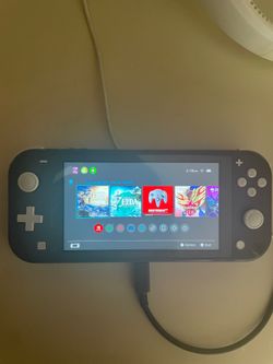 Nintendo switch lite with two Zelda games saved on the system